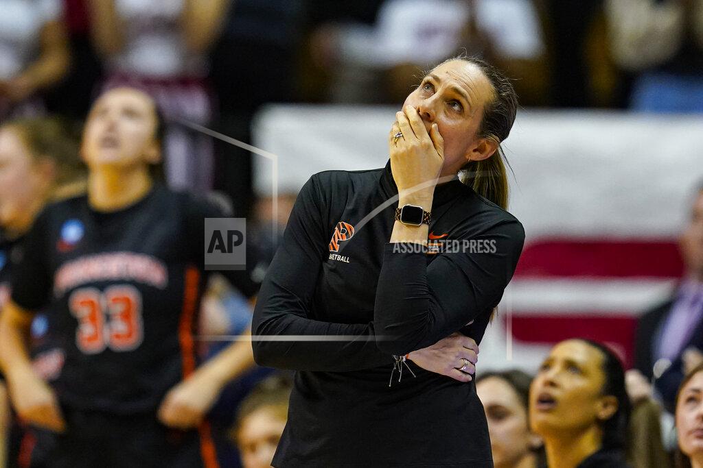 Michael Conroy Princeton head coach Carla Berube watches a replay late in the second half of a college basketball game against Indiana in the second round of the NCAA tournament in Bloomington, Ind., Monday, March 21, 2022. Indiana defeated Princeton 56-55. (AP Photo/Michael Conroy)