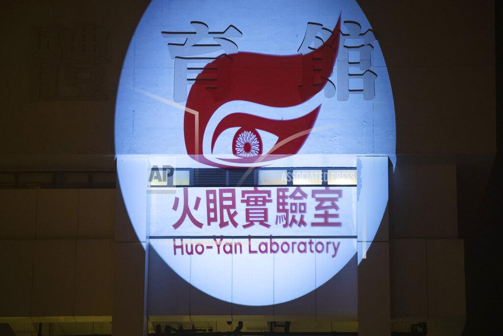 Kin Cheung A temporary mainland Chinese Huo-Yan laboratory is set up for mass testing at Sun Yat Sen Memorial Park Sports Centre in Hong Kong, Thursday, Sept. 3, 2020. Hong Kong has tested more than 120,000 people for the coronavirus at the start of a mass-testing effort that's become another political flash point in the semi-autonomous Chinese territory. Volunteers stood in lines at testing centers to participate in the government initiative, though many residents are distrustful of the resources and staff being provided by China's central government and some fear DNA could be collected. (AP Photo/Kin Cheung)