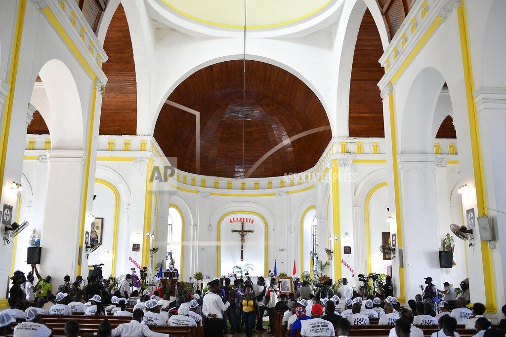 Matias Delacroix People attend a memorial service for assassinated President Jovenel Moïse in the Cathedral of Cap-Haitien, Haiti, Thursday, July 22, 2021. Moïse was killed in his home on July 7. (AP Photo/Matias Delacroix)
