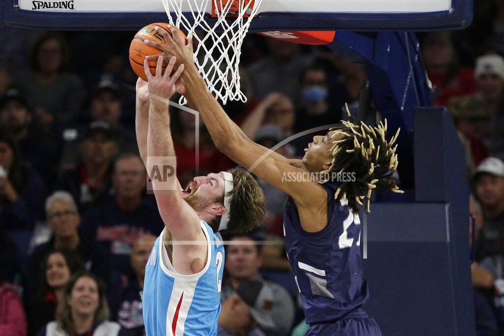 Young Kwak Gonzaga forward Drew Timme, left, and North Florida forward Jadyn Parker go after a rebound during the second half of an NCAA college basketball game, Monday, Nov. 7, 2022, in Spokane, Wash. Gonzaga won 104-63. (AP Photo/Young Kwak)
