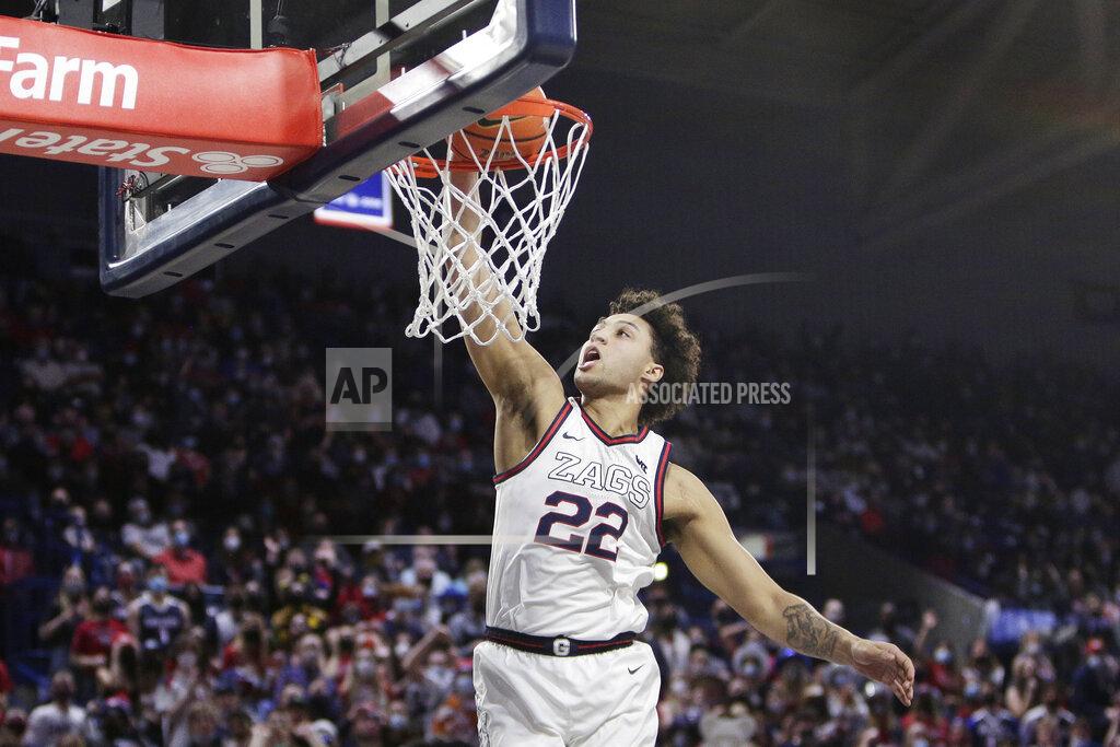 Young Kwak Gonzaga forward Anton Watson dunks during the first half of an NCAA college basketball game against Portland, Saturday, Jan. 29, 2022, in Spokane, Wash. (AP Photo/Young Kwak)