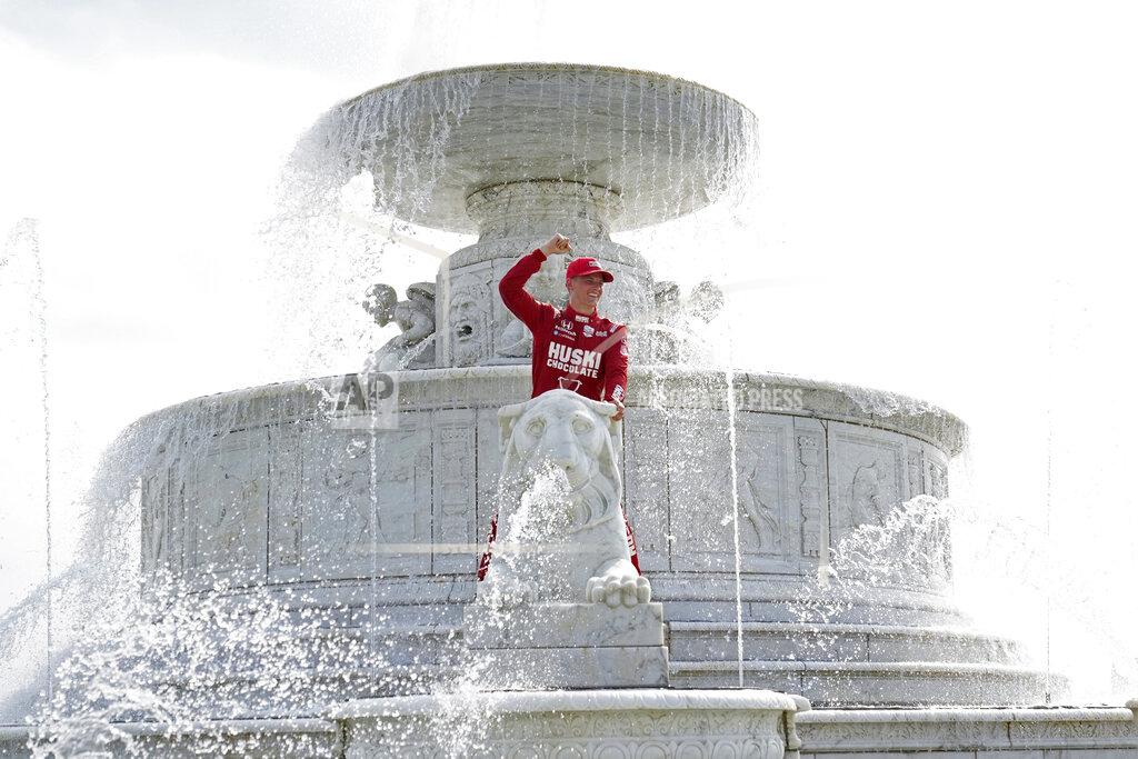 Paul Sancya Marcus Ericsson, of Sweden, celebrates winning the first race of the IndyCar Detroit Grand Prix auto racing doubleheader on Belle Isle in Detroit, Saturday, June 12, 2021. (AP Photo/Paul Sancya)