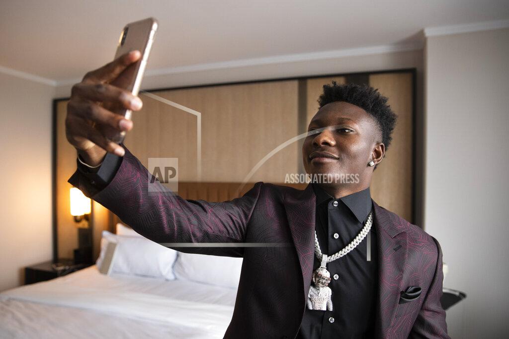 Brett Carlsen IMAGE DISTRIBUTED FOR JCPENNEY - Top NFL Draft prospect, Marquise “Hollywood” Brown, partnered with COLLECTION by Michael Strahan exclusively available at JCPenney to show off his style as he heads to the draft on Thursday, April 25, 2019 in Nashville, Tenn. Brown personalized his jacket liner to represent his nickname and hometown, "Hollywood," and his alma mater, The University of Oklahoma. (Brett Carlsen/AP Images for JCPenney)