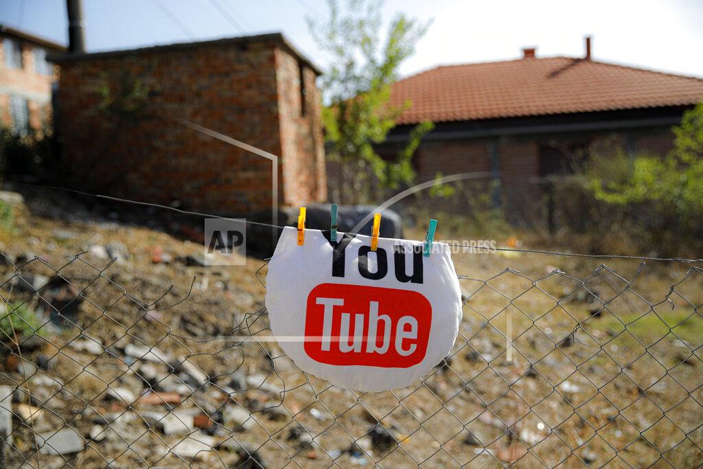 Vadim Ghirda A pillow hangs on a fence to dry in the yard of the Topchu family house in a village on the outskirts of Burgas, Bulgaria, Monday, Sept. 28, 2020. Human rights activists and experts say local officials in several countries with significant Roma populations have used the pandemic to unlawfully target the minority group, which is Europe's largest and has faced centuries of severe discrimination. (AP Photo/Vadim Ghirda)