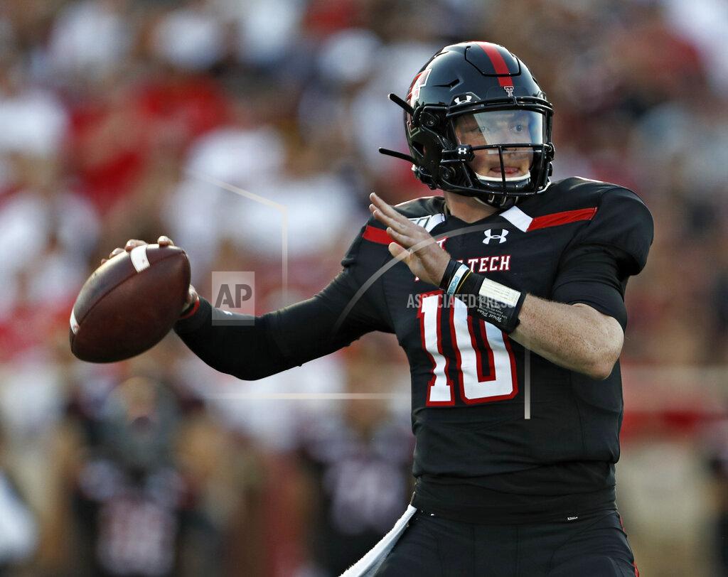 Texas Tech's Alan Bowman looks for a receiver during the first half of the team's NCAA college football game against UTEP on Saturday, Sept. 7, 2019, in Lubbock, Texas. (Brad Tollefson/Lubbock Avalanche-Journal via AP)