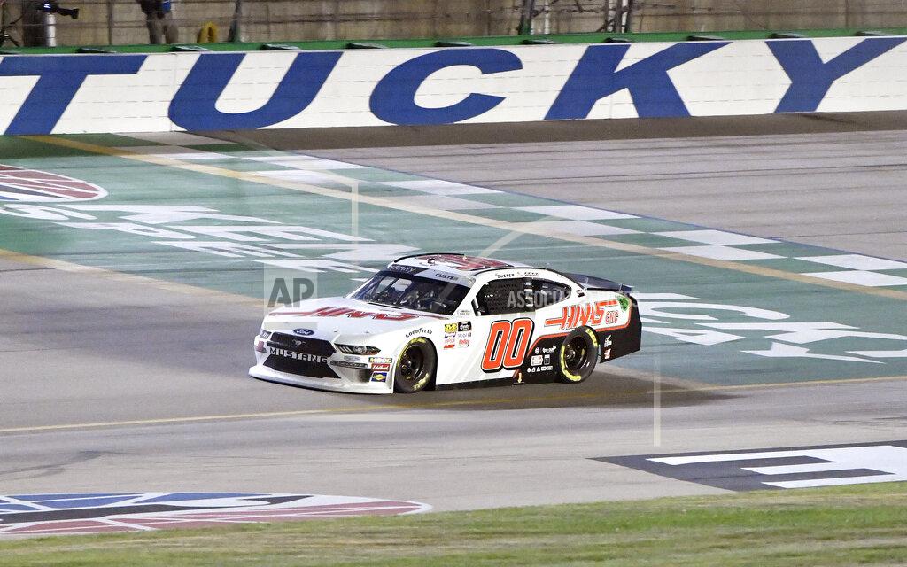 Timothy D. Easley Cole Custer crosses the finish line to win the NASCAR Xfinity Series auto race at Kentucky Speedway in Sparta, Ky., Friday, July 12, 2019. (AP Photo/Timothy D. Easley)