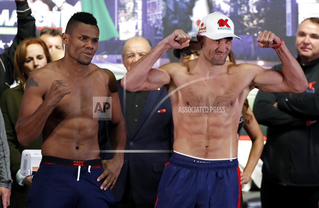 Alvarez makes 1st title defense in rematch with Kovalev