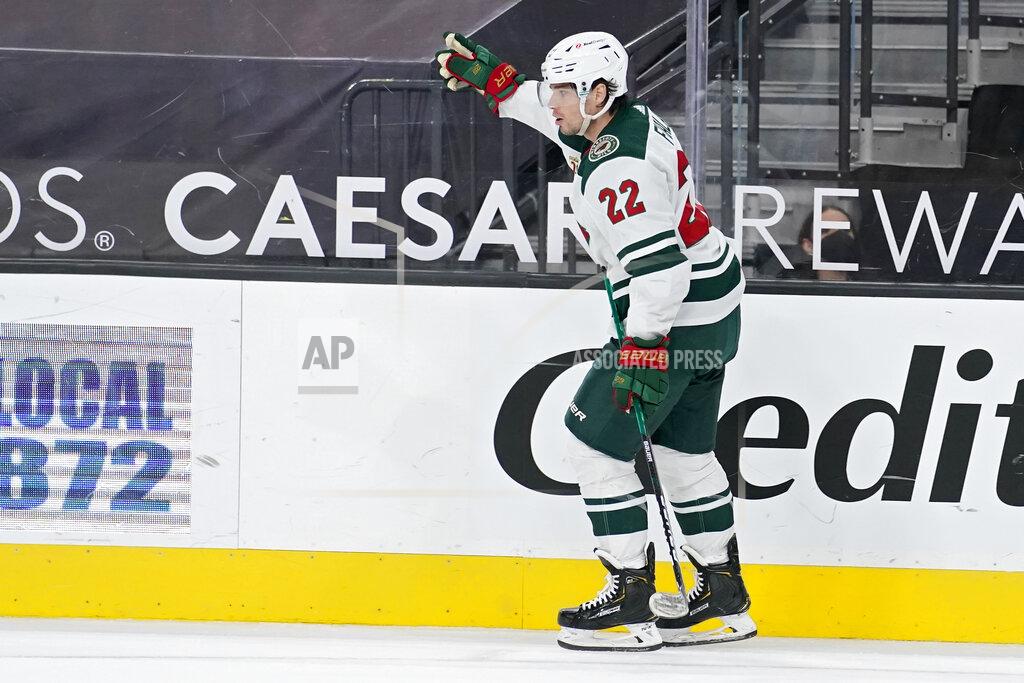 John Locher Minnesota Wild left wing Kevin Fiala (22) celebrates after scoring against the Vegas Golden Knights during a shootout in an NHL hockey game Thursday, April 1, 2021, in Las Vegas. (AP Photo/John Locher)