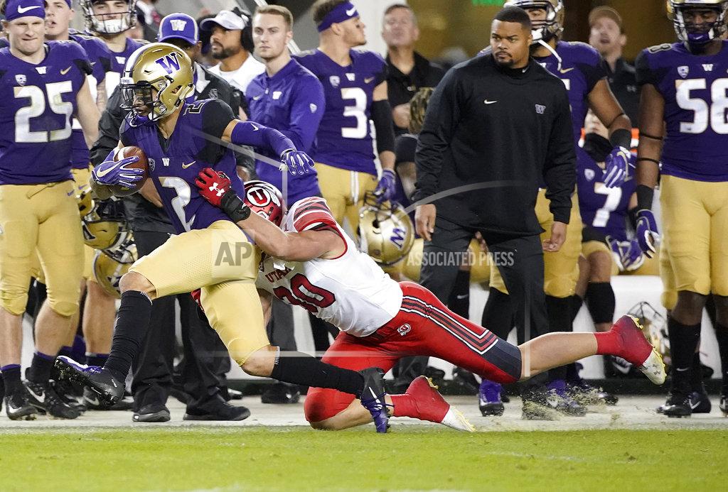 Tony Avelar Washington wide receiver Aaron Fuller (2) tries to get away from Utah linebacker Cody Barton during the first half of the Pac-12 Conference championship NCAA college football game in Santa Clara, Calif., Friday, Nov. 30, 2018. (AP Photo/Tony Avelar)