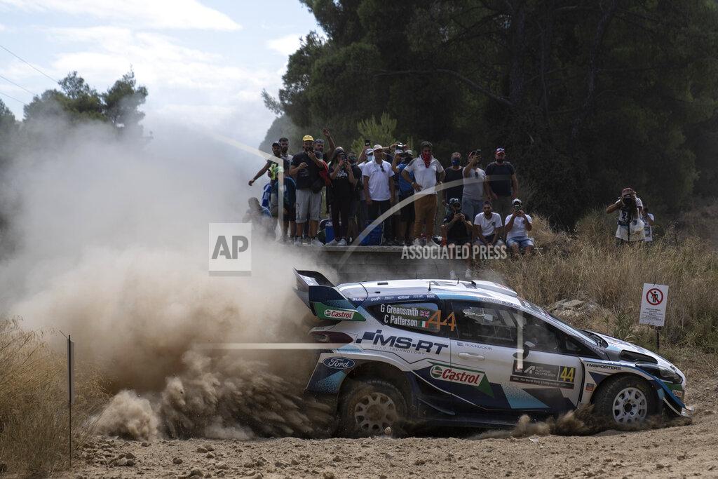 Petros Giannakouris Gus Greensmith from Britain and his co driver Chris Patterson with their Ford Fiesta WRC car compete in the WRC Acropolis Rally at the stage of Aghii Theodori, west of Athens, on Friday, Sept. 10, 2021. The World Rally Championship returned to Greece after an eight-year absence. (AP Photo/Petros Giannakouris)