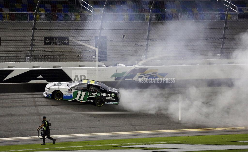 Terry Renna Justin Haley does a burnout after winning a NASCAR Xfinity auto race at Daytona International Speedway, Friday, Aug. 28, 2020, in Daytona Beach, Fla. (AP Photo/Terry Renna)