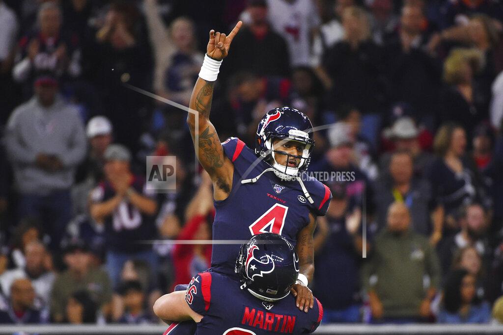 Eric Christian Smith FILE - Houston Texans quarterback Deshaun Watson (4) is lifted by center Nick Martin (66) as they celebrate a touchdown against the New England Patriots during the first half of an NFL football game Sunday, Dec. 1, 2019, in Houston. The NFL suspended Watson for six games on Monday, Aug. 1, 2022 for violating its personal conduct policy following accusations of sexual misconduct made against him by two dozen women in Texas, two people familiar with the decision said. (AP Photo/Eric Christian Smith, File)
