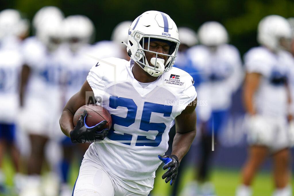 Michael Conroy Indianapolis Colts running back Marlon Mack runs a drill during practice at the NFL team's football training camp in Westfield, Ind., Saturday, July 31, 2021. (AP Photo/Michael Conroy)