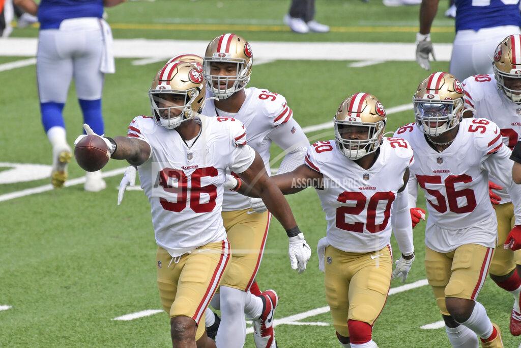 Bill Kostroun San Francisco 49ers' Dion Jordan (96) celebrates a turnover with teammates during the first half of an NFL football game against the New York Giants, Sunday, Sept. 27, 2020, in East Rutherford, N.J. (AP Photo/Bill Kostroun)