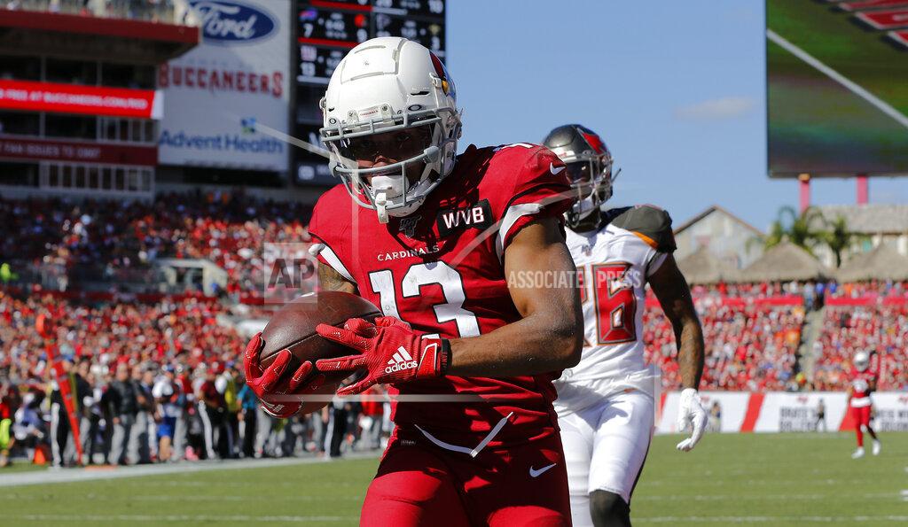 Mark Lomoglio Arizona Cardinals wide receiver Christian Kirk (13) pulls in a 33-yard touchdown pass in front of Tampa Bay Buccaneers cornerback M.J. Stewart (36) during the first half of an NFL football game Sunday, Nov. 10, 2019, in Tampa, Fla. (AP Photo/Mark LoMoglio)