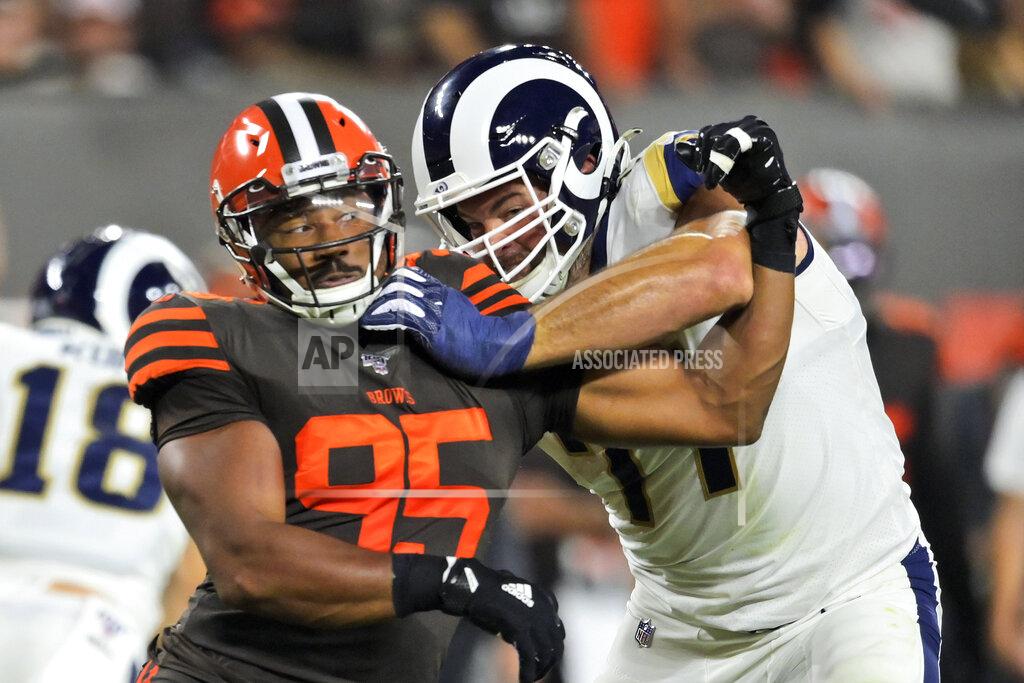 David Richard Cleveland Browns defensive end Myles Garrett (95) tries to get past Los Angeles Rams offensive tackle Andrew Whitworth (77) during the first half of an NFL football game, Sunday, Sept. 22, 2019, in Cleveland. (AP Photo/David Richard)