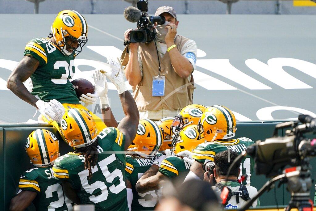 Morry Gash Green Bay Packers' Chandon Sullivan celebrates his interception returned for a touchdown during the second half of an NFL football game against the Detroit Lions Sunday, Sept. 20, 2020, in Green Bay, Wis. (AP Photo/Morry Gash)