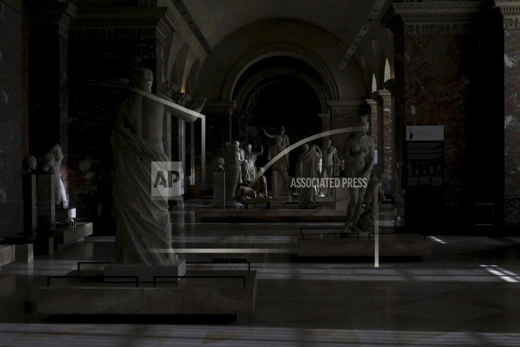 Thibault Camus A view of the hall of Greek sculptures in a deserted Louvre museum, in Paris, Thursday, Feb. 11, 2021. Though empty corridors and vacant galleries are a grim sight for frustrated art-lovers, they are a golden opportunity to do works of renovation, refurbishment and re-ordering that were simply not possible with the around 10 million visitors per year. (AP Photo/Thibault Camus)