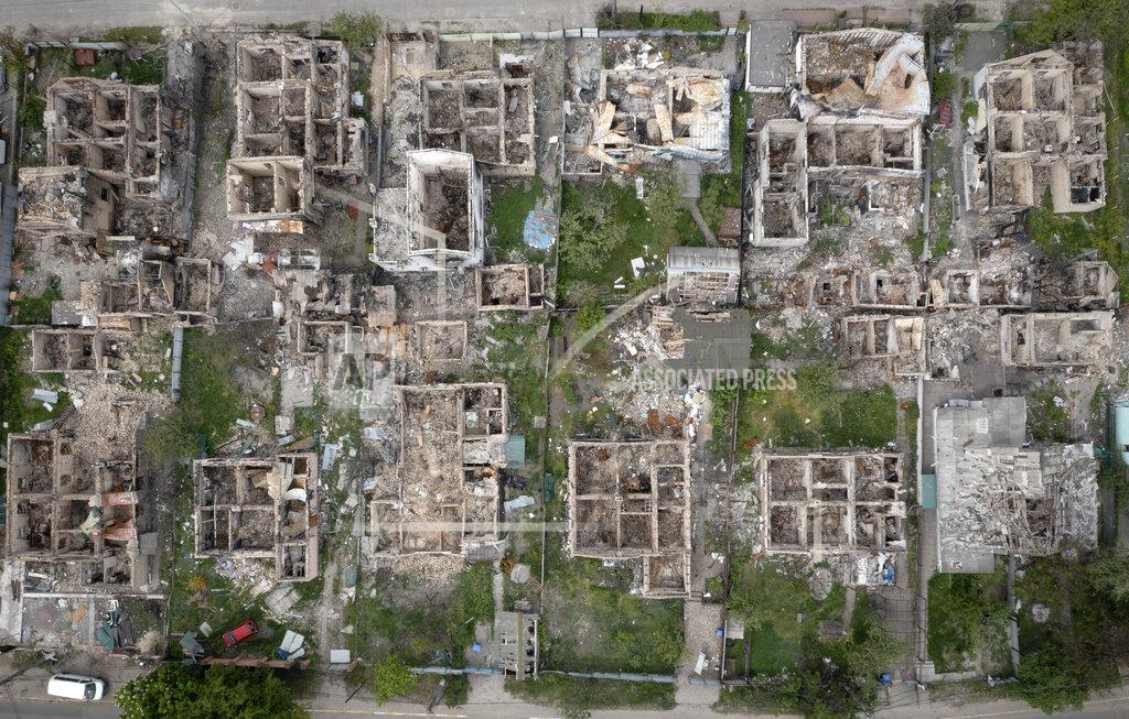 Efrem Lukatsky An aerial view of a residential area ruined by the Russian shelling in Irpin close to Kyiv, Ukraine, Saturday, May 21, 2022. (AP Photo/Efrem Lukatsky)