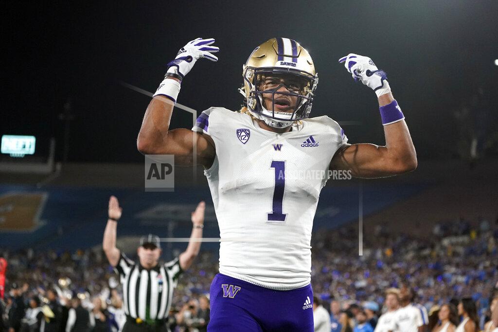 Marcio Jose Sanchez Washington wide receiver Rome Odunze (1) celebrates his touchdown catch against UCLA during the first half of an NCAA college football game Friday, Sept. 30, 2022, in Pasadena, Calif. (AP Photo/Marcio Jose Sanchez)