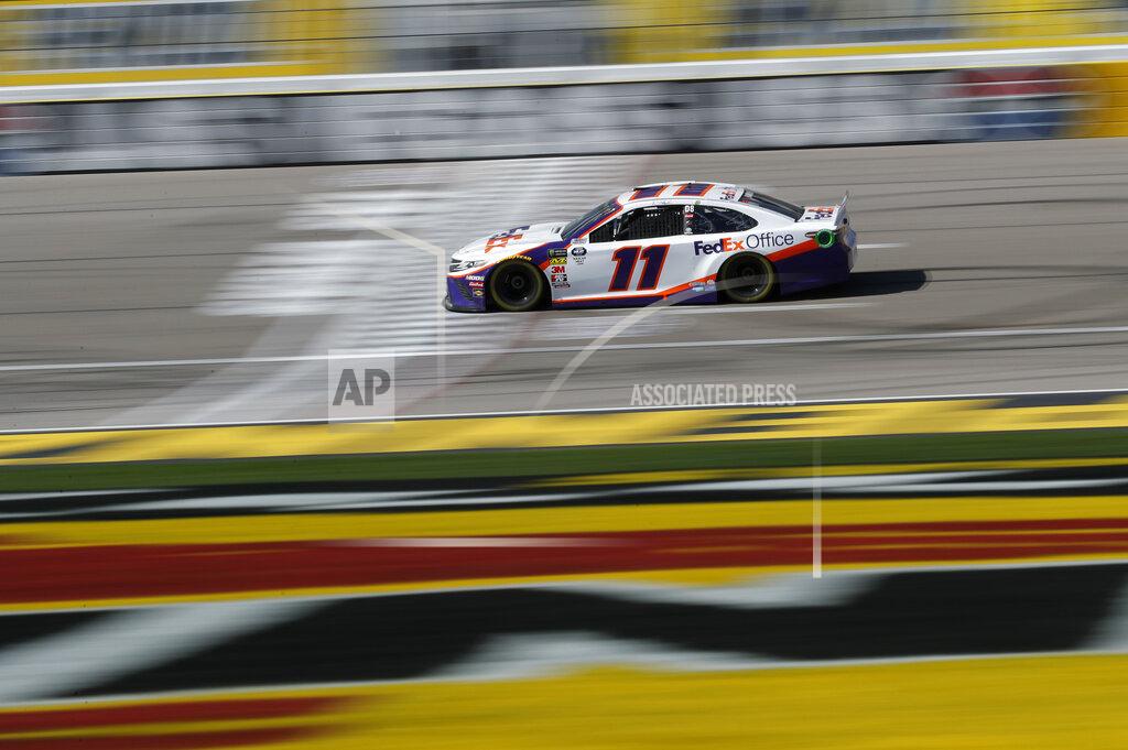 John Locher Denny Hamlin drives during a NASCAR Cup Series auto race at the Las Vegas Motor Speedway, Sunday, March 3, 2019, in Las Vegas. (AP Photo/John Locher)