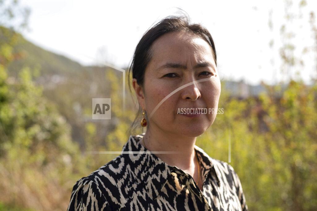 Paul Johannessen Uyghur Mihrigul Musa poses for a photo in her yard in Bergen, Norway, on May 8, 2022. Data leaked to The Associated Press shows that in a single county in the Uyghur heartland of China, the imprisonment rate is by far the highest known in the world, over 30 times higher than the rest of China. (AP Photo/Paul Johannessen)