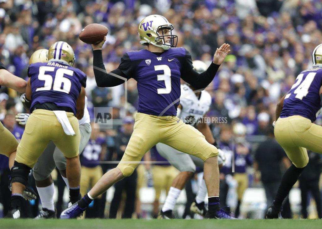 Ted S. Warren Washington quarterback Jake Browning passes against Colorado during the first half of an NCAA college football game, Saturday, Oct. 20, 2018, in Seattle. (AP Photo/Ted S. Warren)