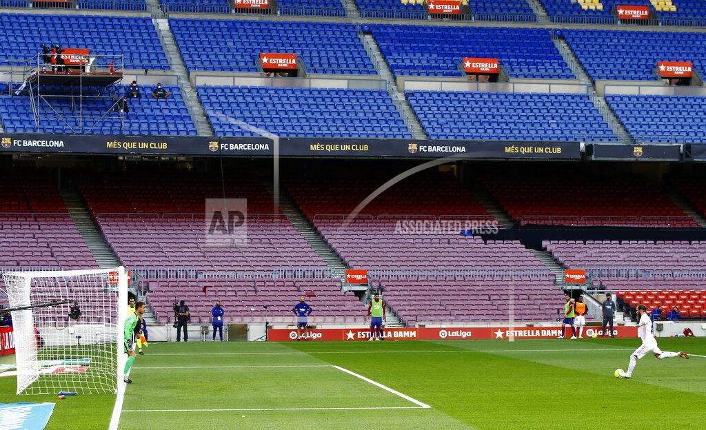 Joan Monfort Real Madrid's Sergio Ramos kicks a penalty scoring his side's 2nd goal during the Spanish La Liga soccer match between FC Barcelona and Real Madrid at the Camp Nou stadium in Barcelona, Spain, Saturday, Oct. 24, 2020. (AP Photo/Joan Monfort)