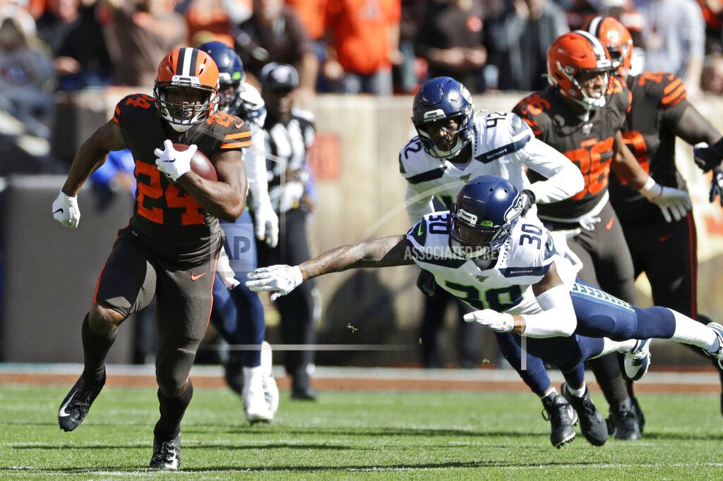 Ron Schwane Cleveland Browns running back Nick Chubb (24) rushes against the Seattle Seahawks during the first half of an NFL football game, Sunday, Oct. 13, 2019, in Cleveland. (AP Photo/Ron Schwane)