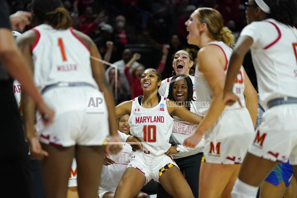 Julio Cortez The Maryland reacts after guard Diamond Miller (1) made a block on a shot by Florida Gulf Coast guard Tishara Morehouse during the first half of a college basketball game in the second round of the NCAA tournament, Sunday, March 20, 2022, in College Park, Md. (AP Photo/Julio Cortez)