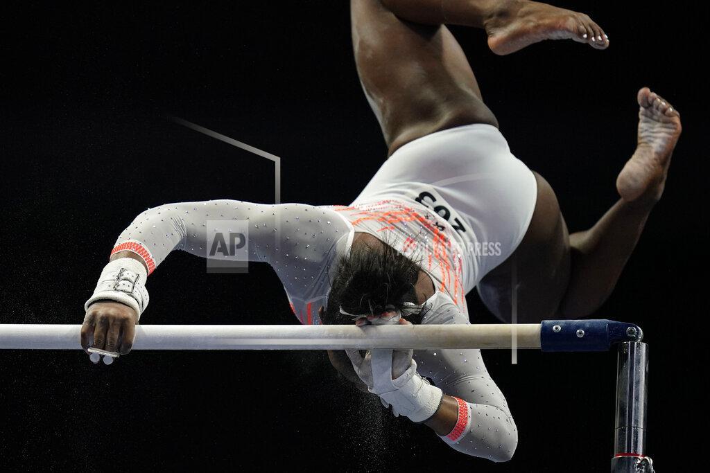Aj Mast Simone Biles wipes out during her routine on the uneven bars during the U.S. Classic gymnastics competition in Indianapolis, Saturday, May 22, 2021. (AP Photo/AJ Mast)