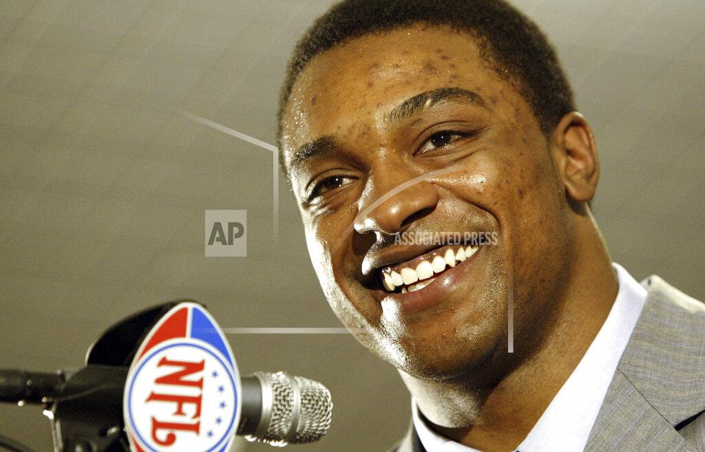 Adam Rountree FILE - In this April 23, 2005 file photo Cedric Benson, a running back from Texas, talks to the media after he was chosen the first pick of the Chicago Bears, the fourth overall, at the 2005 NFL draft in New York. Benson, one of the most prolific rushers in NCAA and University of Texas history, has died in a motorcycle accident in Texas, Saturday, Aug. 17, 2019. He was 36. (AP Photo/Adam Rountree, file)