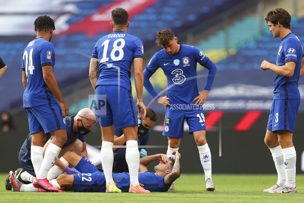 Catherine Ivill Chelsea's Christian Pulisic is injured during the FA Cup final soccer match between Arsenal and Chelsea at Wembley stadium in London, England, Saturday, Aug.1, 2020. (Catherine Ivill/Pool via AP)