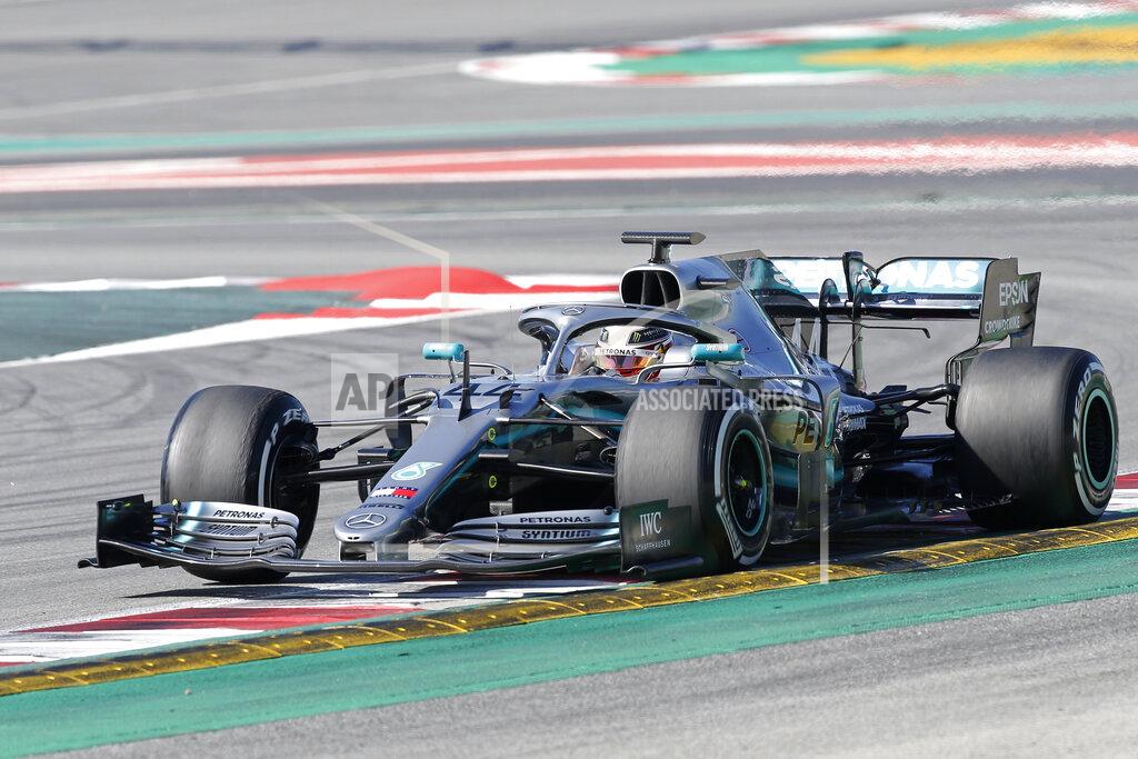 Joan Monfort Mercedes driver Lewis Hamilton of Britain steers his car during a Formula One pre-season testing session at the Catalunya racetrack in Montmelo, outside Barcelona, Spain, Tuesday, Feb. 26, 2019. (AP Photo/Joan Monfort)