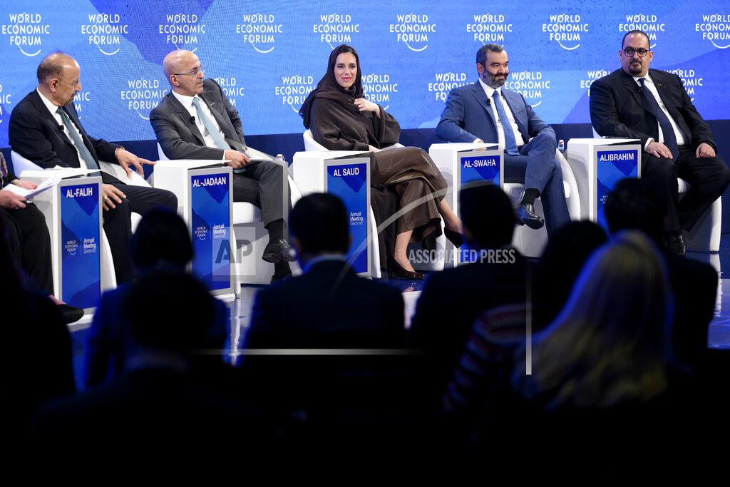 Laurent Gillieron Khalid Al-Falih, Minister of Investment of Saudi Arabia, Mohammed Al-Jadaan, Minister of Finance of Saudi Arabia, Haifa Bint Mohammed Al Saud, Assistant Minister for Strategy and Executive Affairs, Ministry of Tourism of Saudi Arabia, Abdullah AlSwaha, Minister of Communications and Information Technology of Saudi Arabia and Faisal Alibrahim, Minister of Economy and Planning of Saudi Arabia, from left, attend a Stakeholder Dialogue, during the 51st annual meeting of the World Economic Forum, WEF, in Davos, Switzerland, on Wednesday, May 25, 2022. The forum has been postponed due to the Covid-19 outbreak and was rescheduled to early summer. The meeting brings together entrepreneurs, scientists, corporate and political leaders in Davos under the topic "History at a Turning Point: Government Policies and Business Strategies" from 22 - 26 May 2022. (Laurent Gillieron/Keystone via AP)