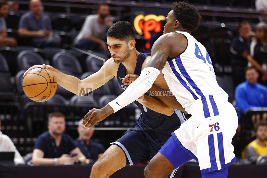 Jeff Swinger Memphis Grizzlies forward Santi Aldama (7) drives against Philadelphia 76ers forward Paul Reed Jr. (44) during the first quarter of an NBA summer league basketball game Tuesday, July 5, 2022, in Salt Lake City. (AP Photo/Jeff Swinger)