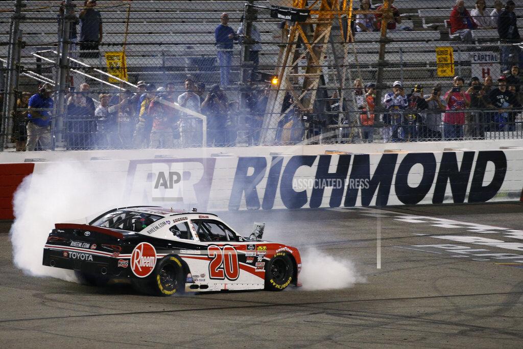 Steve Helber Christopher Bell does a burnout as he celebrates winning the NASCAR Xfinity Series auto race at Richmond Raceway in Richmond, Va., Friday, Sept. 20, 2019. (AP Photo/Steve Helber)