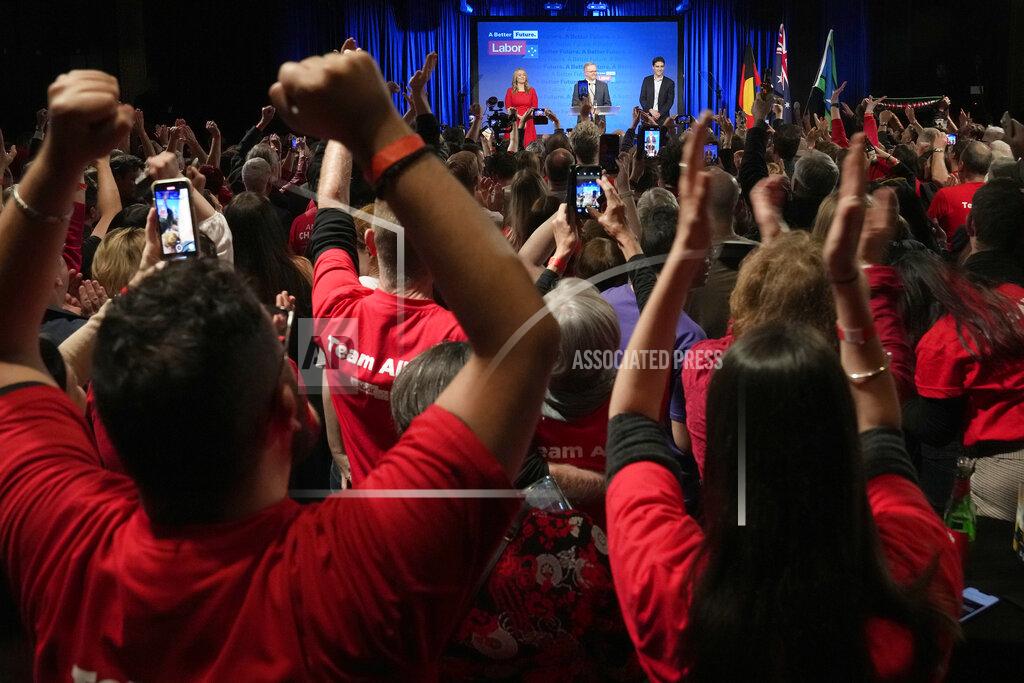 Rick Rycroft Labor Party leader Anthony Albanese, center back, speaks to supporters at a Labor Party event in Sydney, Australia, Sunday, May 22, 2022, after Prime Minister Scott Morrison conceding defeat to Albanese in a federal election. (AP Photo/Rick Rycroft)