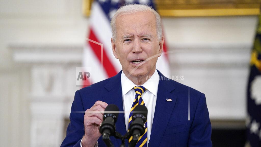 Evan Vucci President Joe Biden speaks about reaching 300 million COVID-19 vaccination shots, in the State Dining Room of the White House, Friday, June 18, 2021, in Washington. (AP Photo/Evan Vucci)