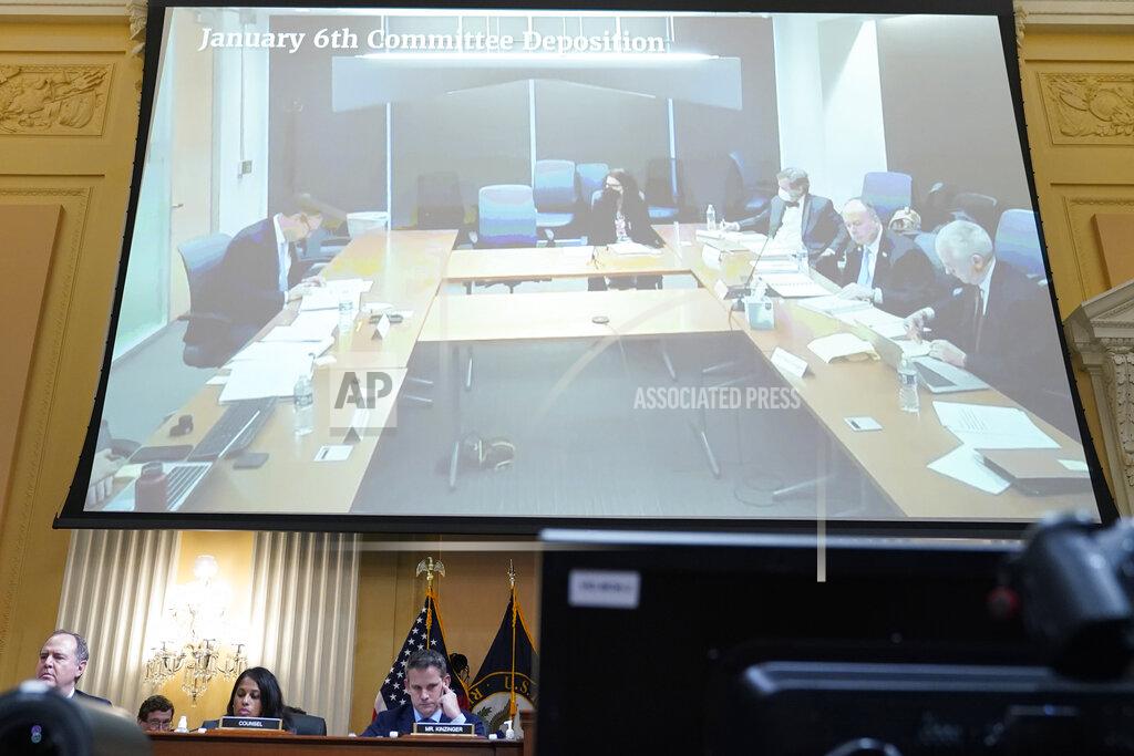 Jacquelyn Martin A video of a deposition of Jeffrey Clark is displayed as the House select committee investigating the Jan. 6 attack on the U.S. Capitol continues to reveal its findings of a year-long investigation, at the Capitol in Washington, Thursday, June 23, 2022. (AP Photo/Jacquelyn Martin)