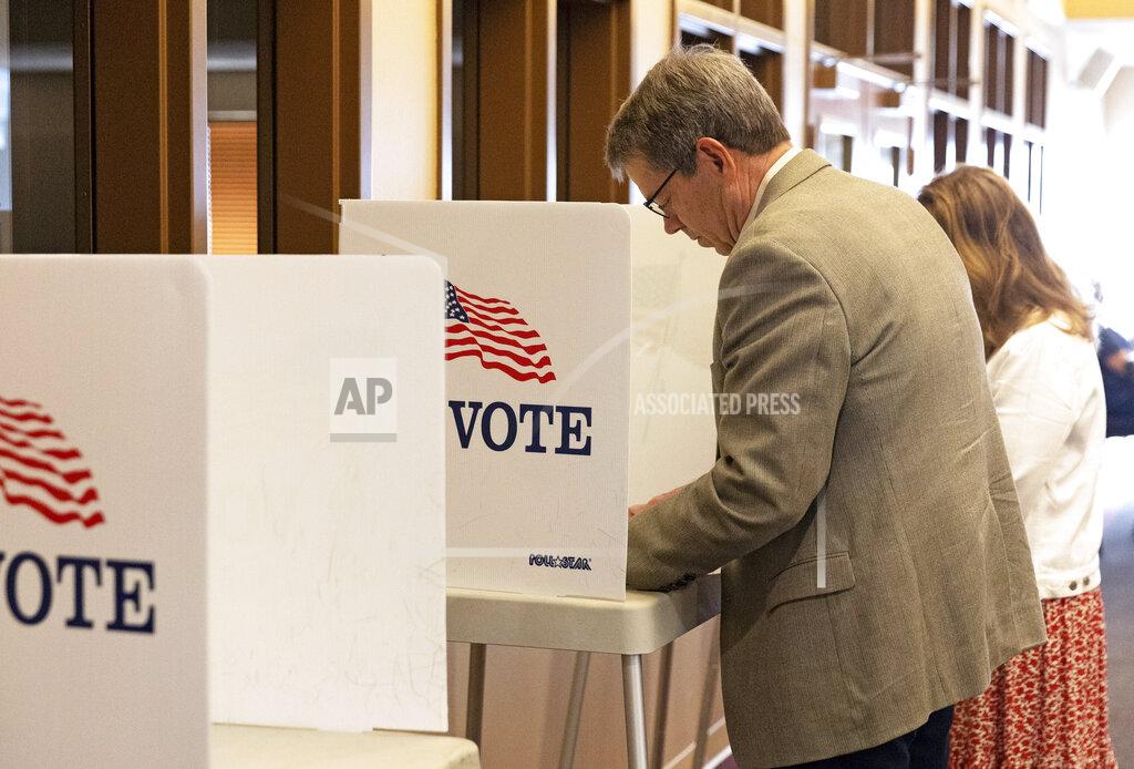 Eileen T. Meslar Jim Pillen votes at his polling place, Columbus Berean Church, in Columbus, Neb., on Tuesday, May 10, 2022. (Eileen T. Meslar/Omaha World-Herald via AP)