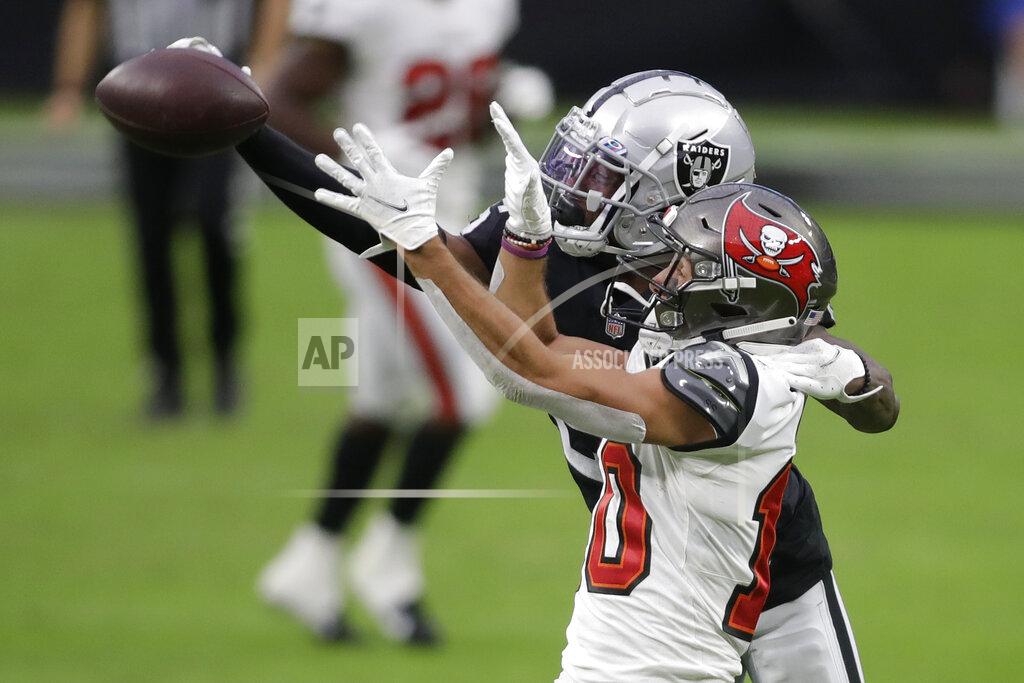 Isaac Brekken Las Vegas Raiders cornerback Nevin Lawson (26) guards Tampa Bay Buccaneers wide receiver Scott Miller (10) during the first half of an NFL football game, Sunday, Oct. 25, 2020, in Las Vegas. (AP Photo/Isaac Brekken)