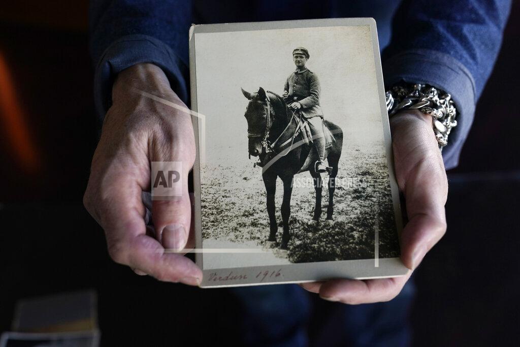 Marcio Jose Sanchez Jed Leiber shows a photo of his grandfather Saemy Rosenberg as a cavalry officer with the German army during WWI at home Thursday, Dec. 3, 2020, in Los Angeles. (AP Photo/Marcio Jose Sanchez)