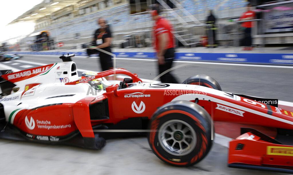 Luca Bruno Formula 2 driver Mick Schumacher steers his Prema racing team car during the Formula 2 qualifying session at the Bahrain International Circuit in Sakhir, Bahrain, Friday, March 29, 2019. It promises to be a whirlwind few days for the son of Formula One great Michael Schumacher, as he makes his F2 debut this weekend and then drives in his first F1 test for Ferrari on Tuesday. (AP Photo/Luca Bruno)