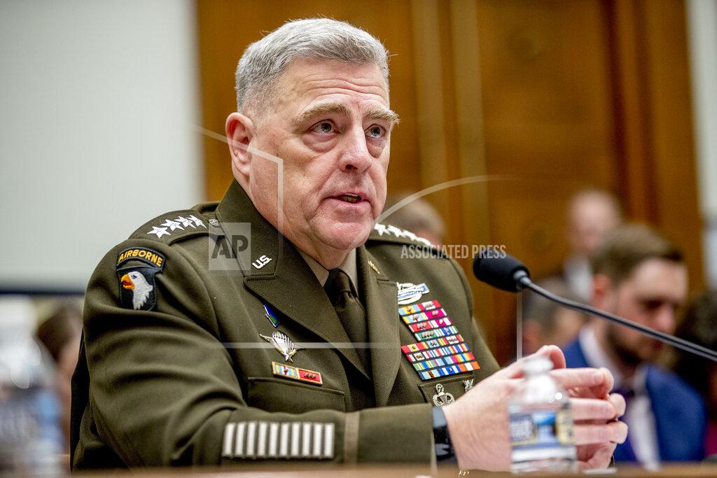 FILE - In this Feb. 26, 2020 file photo, Joint Chiefs of Staff Chairman Gen. Mark Milley speaks at a House Armed Services Committee hearing on Capitol Hill in Washington. The top U.S. military officer is telling Congress that the U.S. armed forces will have no role in carrying out the election process or resolving a disputed vote. The comments from Gen. Mark Milley, chairman of the Joint Chiefs of Staff, underscore the extraordinary political environment in America, where the president has declared without evidence that the expected surge in mail-in ballots will make the vote “inaccurate and fraudulent,” (AP Photo/Andrew Harnik)