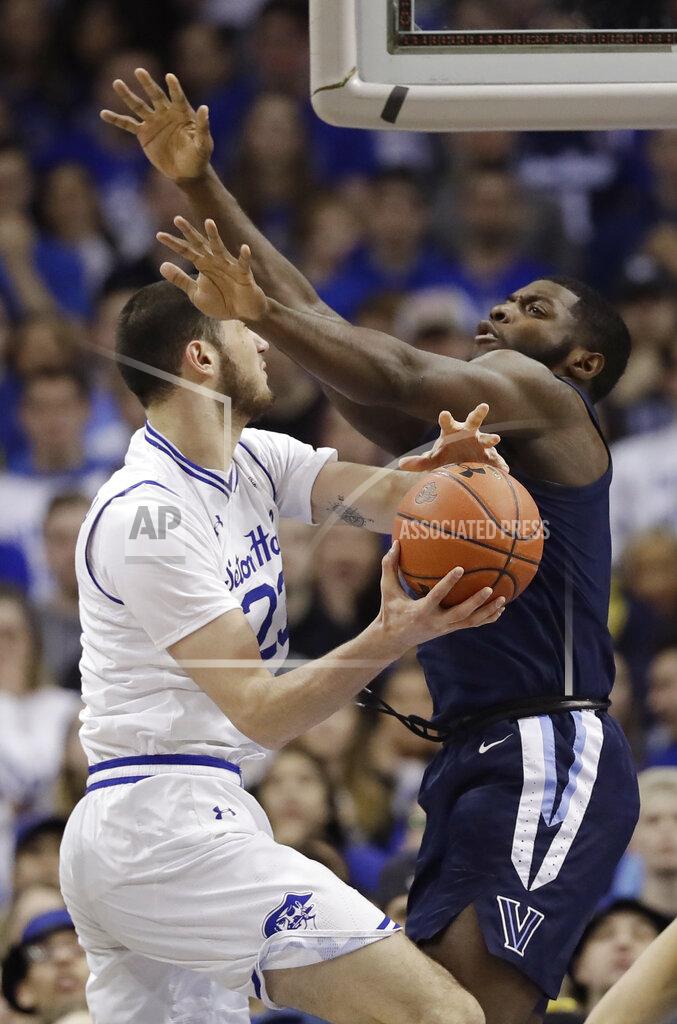 Kathy Willens Villanova forward Eric Paschall (4) defends Seton Hall forward Sandro Mamukelashvili (23) during the first half of an NCAA college basketball game, Saturday, March 9, 2019, in Newark, N.J. (AP Photo/Kathy Willens)