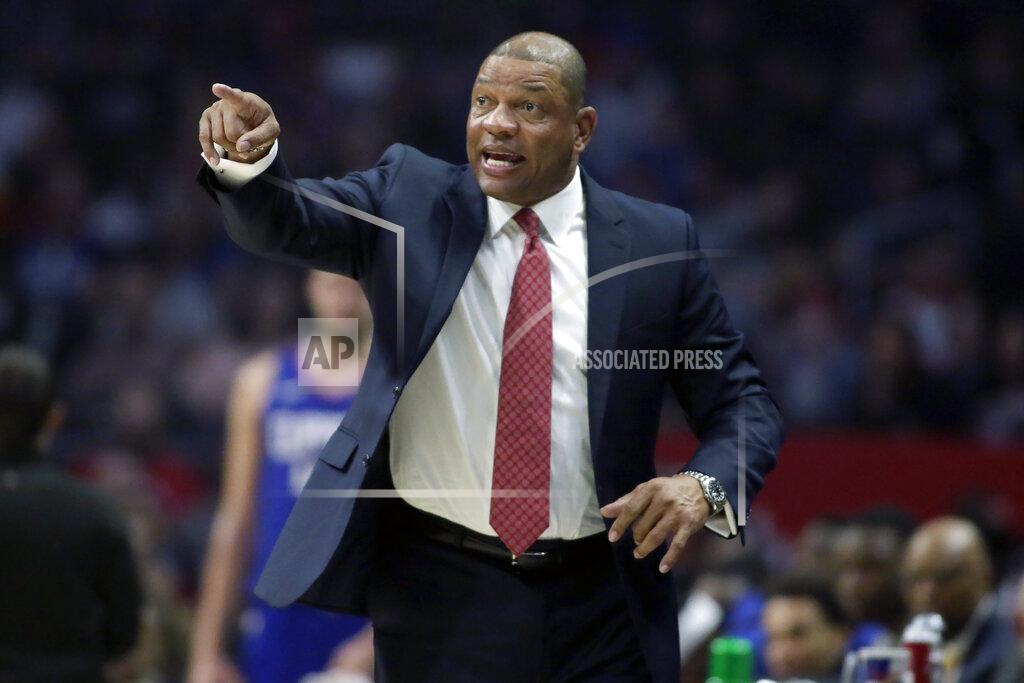 Los Angeles Clippers head coach Doc Rivers talks to his players during the first half of an NBA basketball game against the Minnesota Timberwolves in Los Angeles, Saturday, Feb. 1, 2020. (AP Photo/Alex Gallardo)
