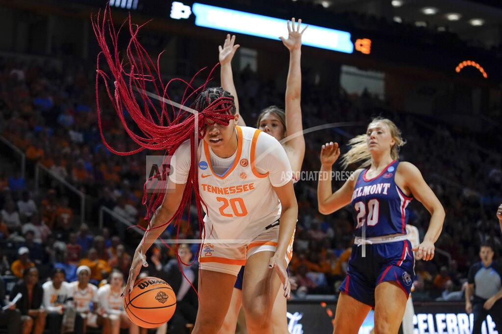 Mark Humphrey Tennessee's Tamari Key, left, tries to control a rebound in front of Belmont's Madison Bartley, center, and Conley Chinn, right, in the second half of a women's college basketball game in the second round of the NCAA tournament Monday, March 21, 2022, in Knoxville, Tenn. Tennessee won 70-67. (AP Photo/Mark Humphrey)
