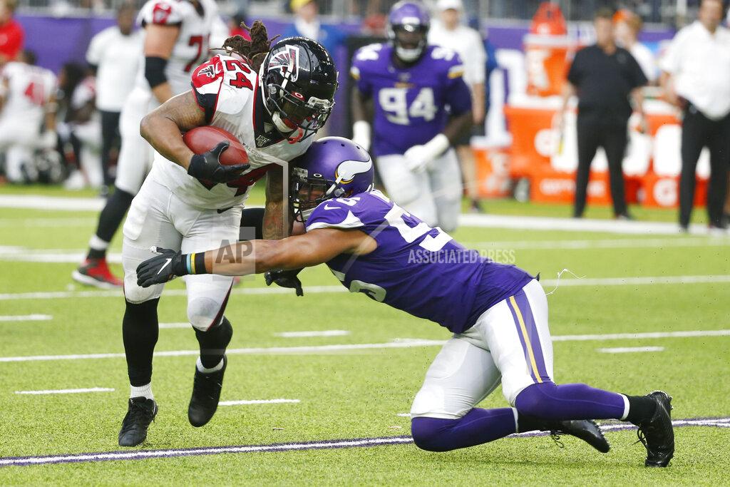 Bruce Kluckhohn Atlanta Falcons running back Devonta Freeman, left, is tackled by Minnesota Vikings outside linebacker Anthony Barr, right, during the second half of an NFL football game, Sunday, Sept. 8, 2019, in Minneapolis. (AP Photo/Bruce Kluckhohn)