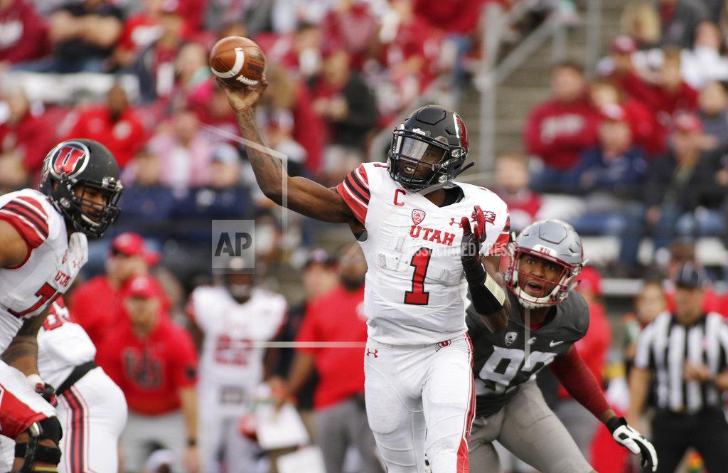Young Kwak FILE - In this Sept. 29, 2018, file photo, Utah quarterback Tyler Huntley (1) throws a pass in front of Washington State defensive end Will Rodgers III (92) during the second half of an NCAA college football game in Pullman, Wash. Utah, which plays Stanford this week, is averaging just 16 points per game against FBC competition as Huntley hasn't thrown a TD pass since a season-opening win against FCS-level Weber State. (AP Photo/Young Kwak, File)